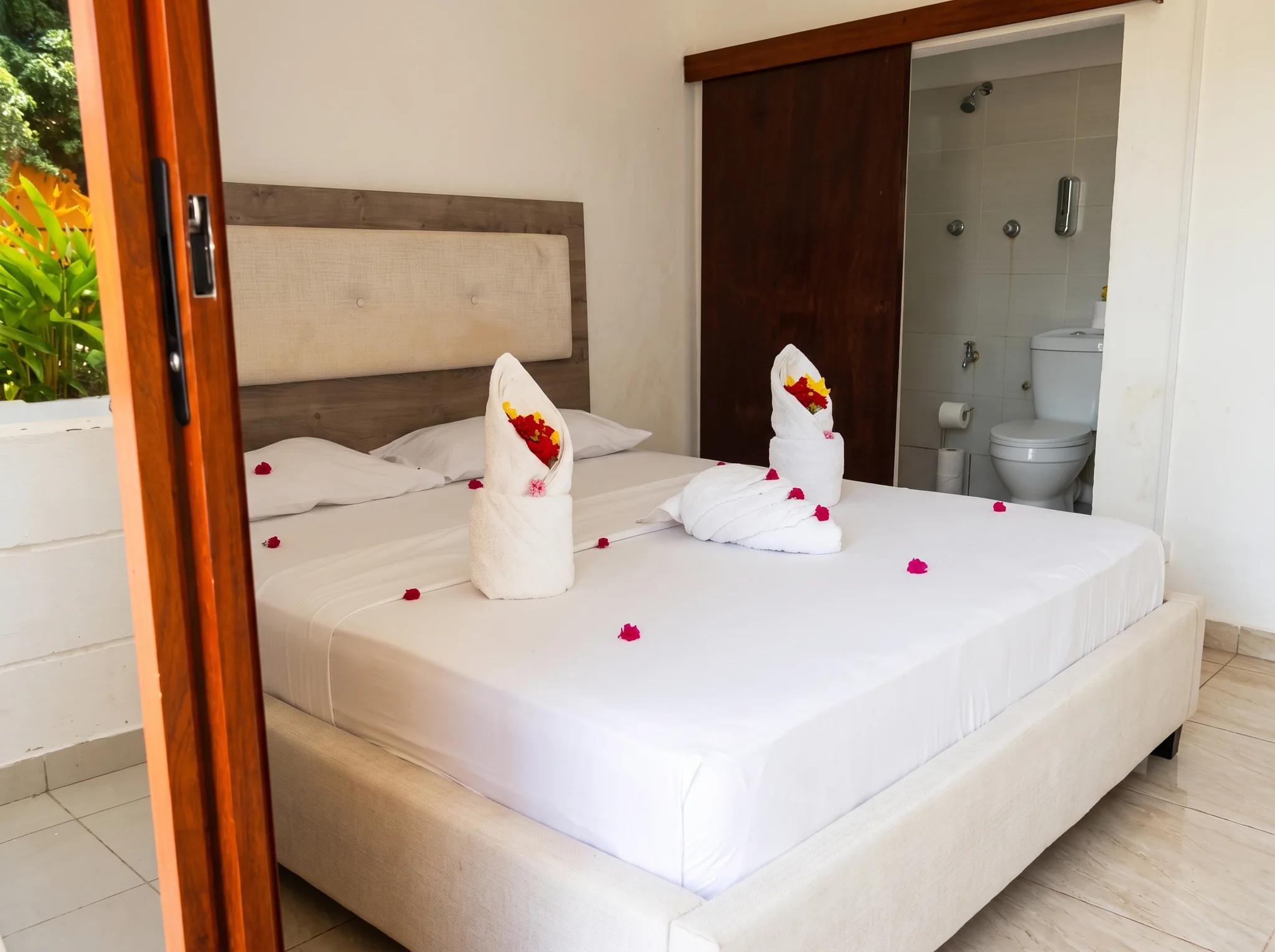 Standard Room King Bed and Balcony View